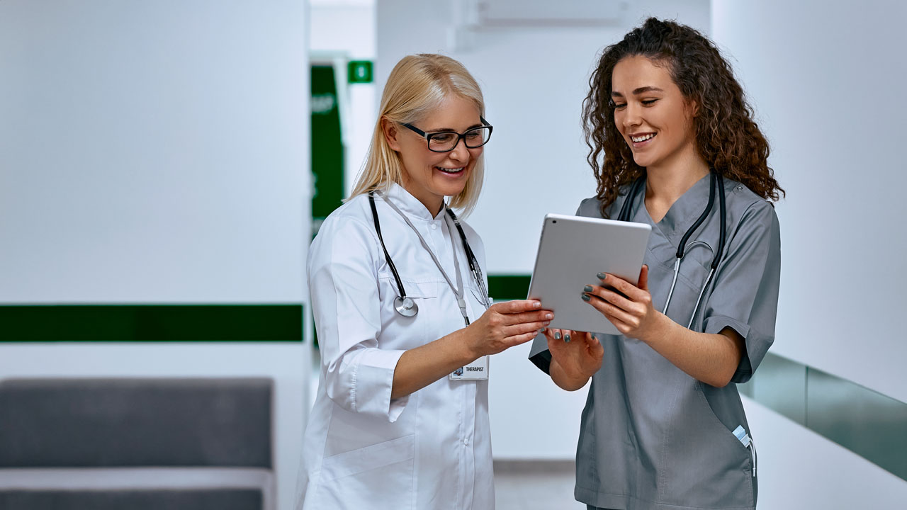 Doctor talking to a nurse